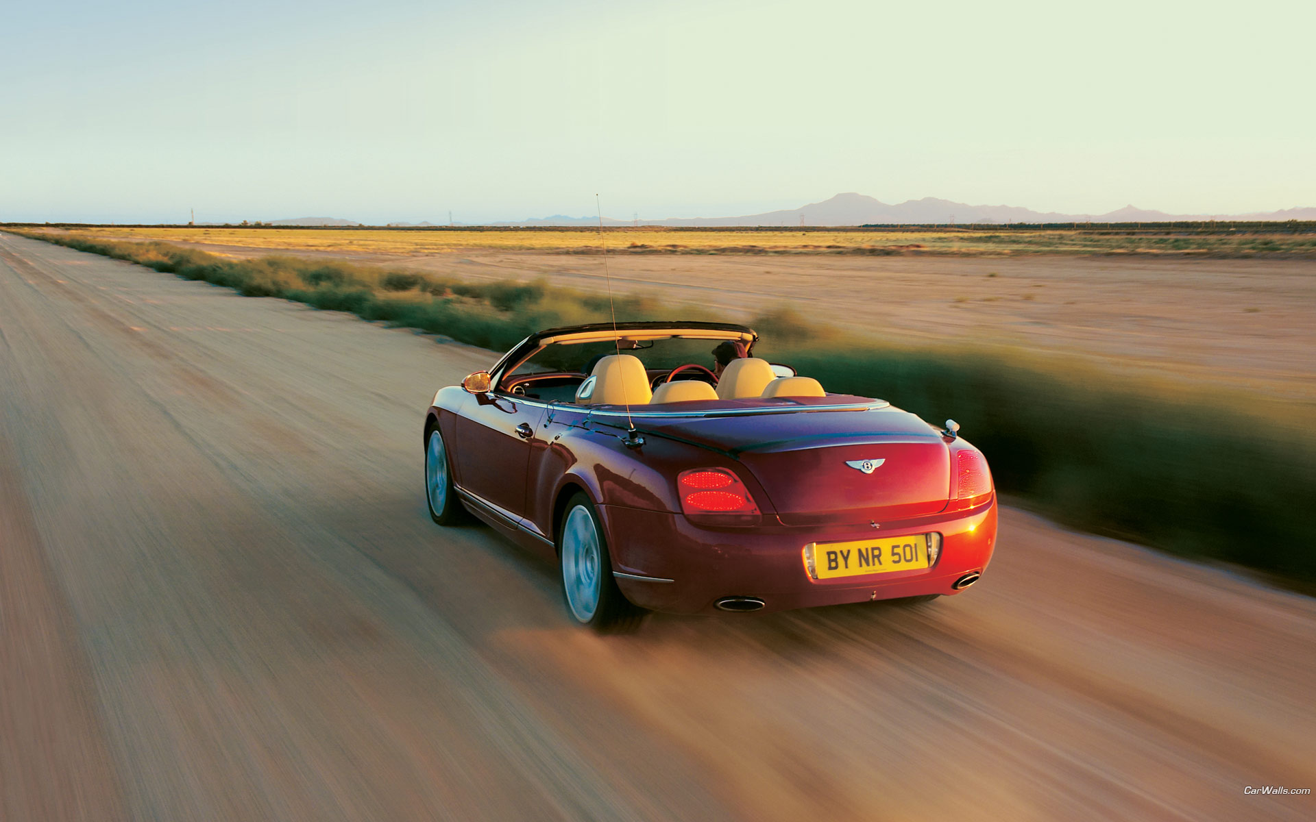 Download full size Continental GTC red road Bentley wallpaper / 1920x1200