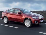 X6 red side road / Bmw