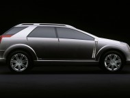 side silver car / Cadillac