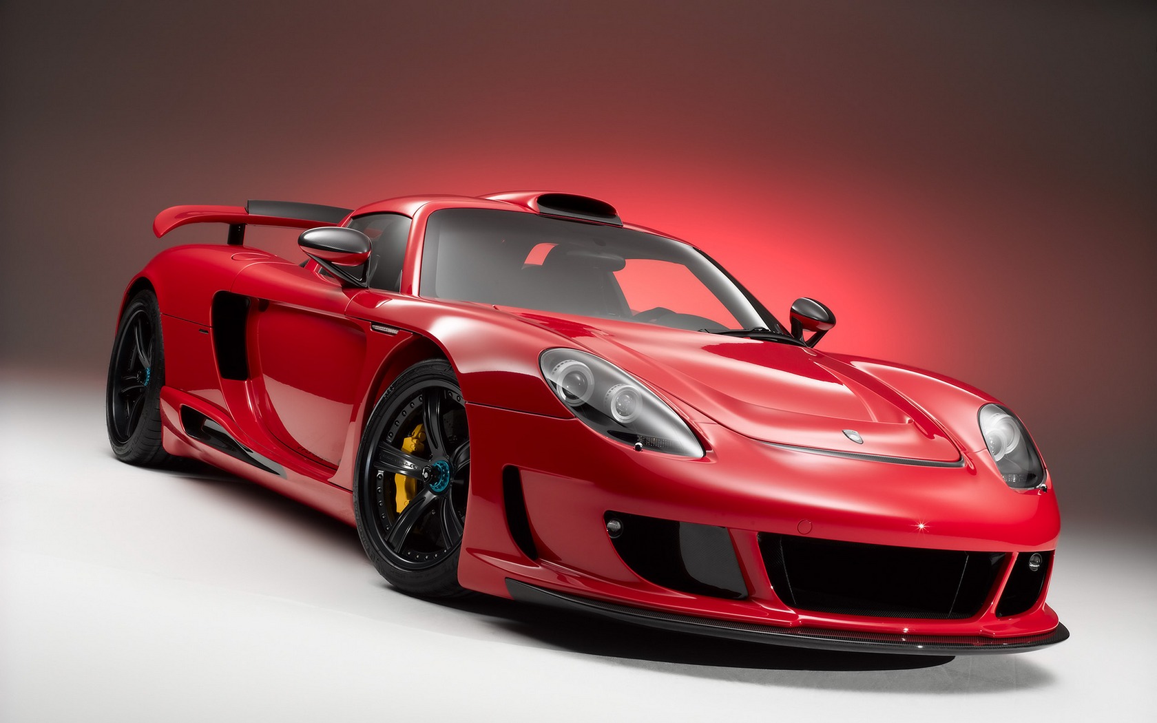 Download full size Porsche-Carrera-GT red Porshe wallpaper / 1680x1050