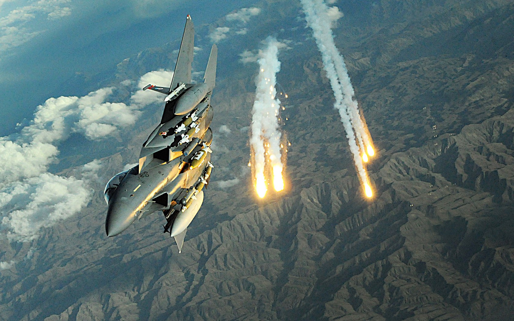 Download HQ F-15 Strike Eagle Deploys Countermesures Military Airplanes wallpaper / 1680x1050