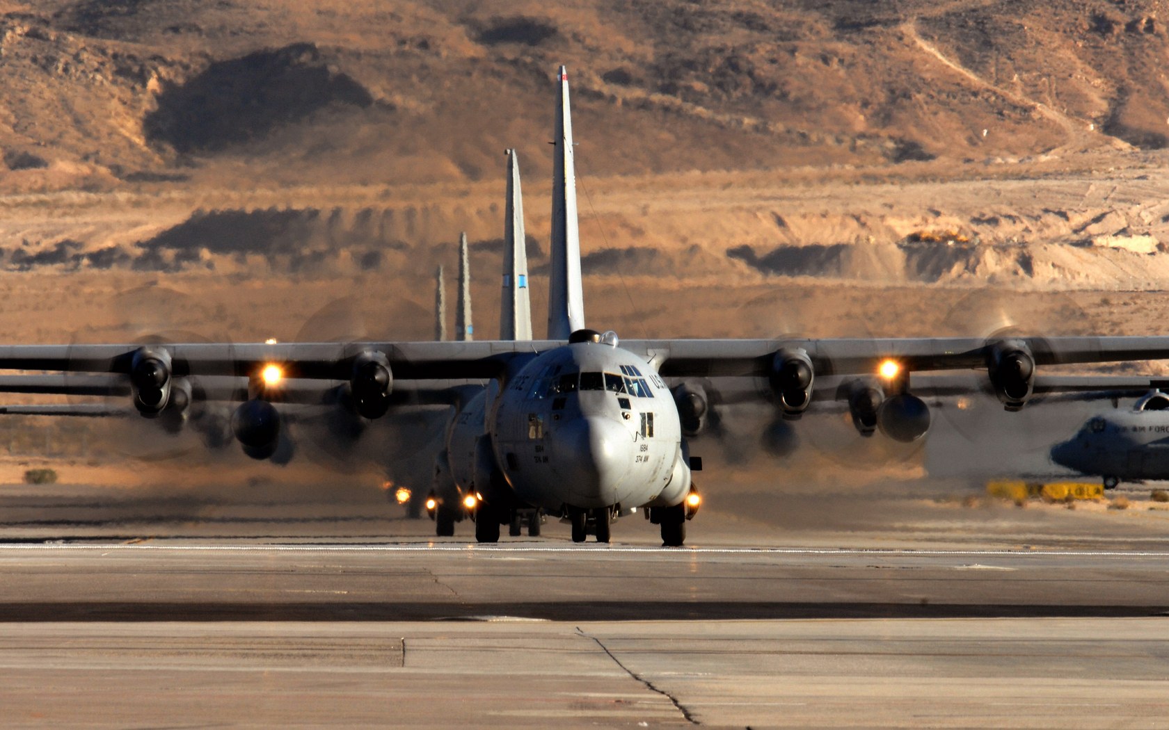 Download HQ C-130 Hercules prepares to take off Military Airplanes wallpaper / 1680x1050